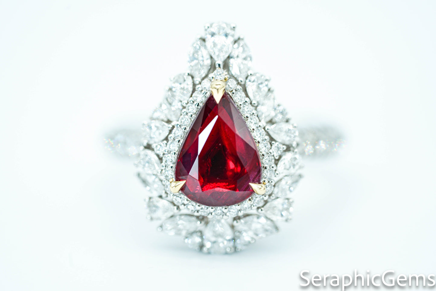 "Timeless Elegance: Pear-Shaped Pigeon Blood Ruby Ring in 18K Gold"