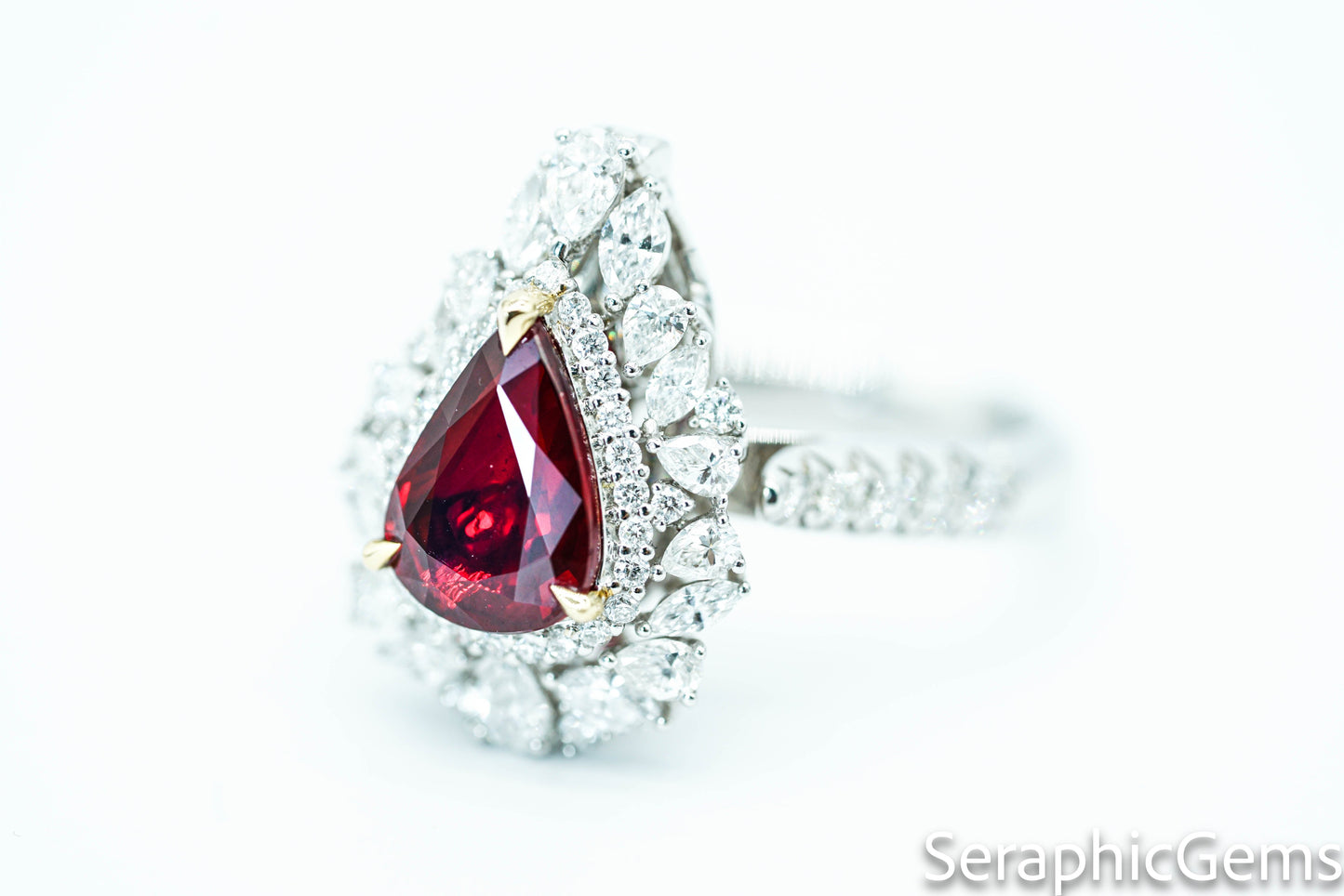 "Timeless Elegance: Pear-Shaped Pigeon Blood Ruby Ring in 18K Gold"