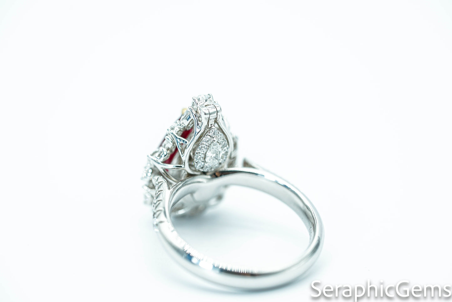 "Timeless Elegance: Pear-Shaped Pigeon Blood Ruby Ring in 18K Gold"