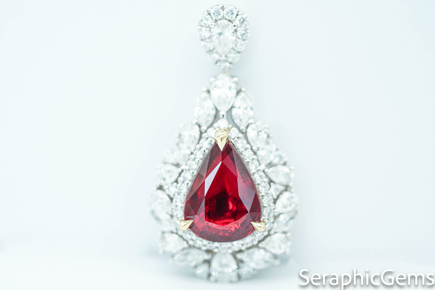 "Timeless Elegance: Pear-Shaped Pigeon Blood Ruby Ring in 18K Gold"