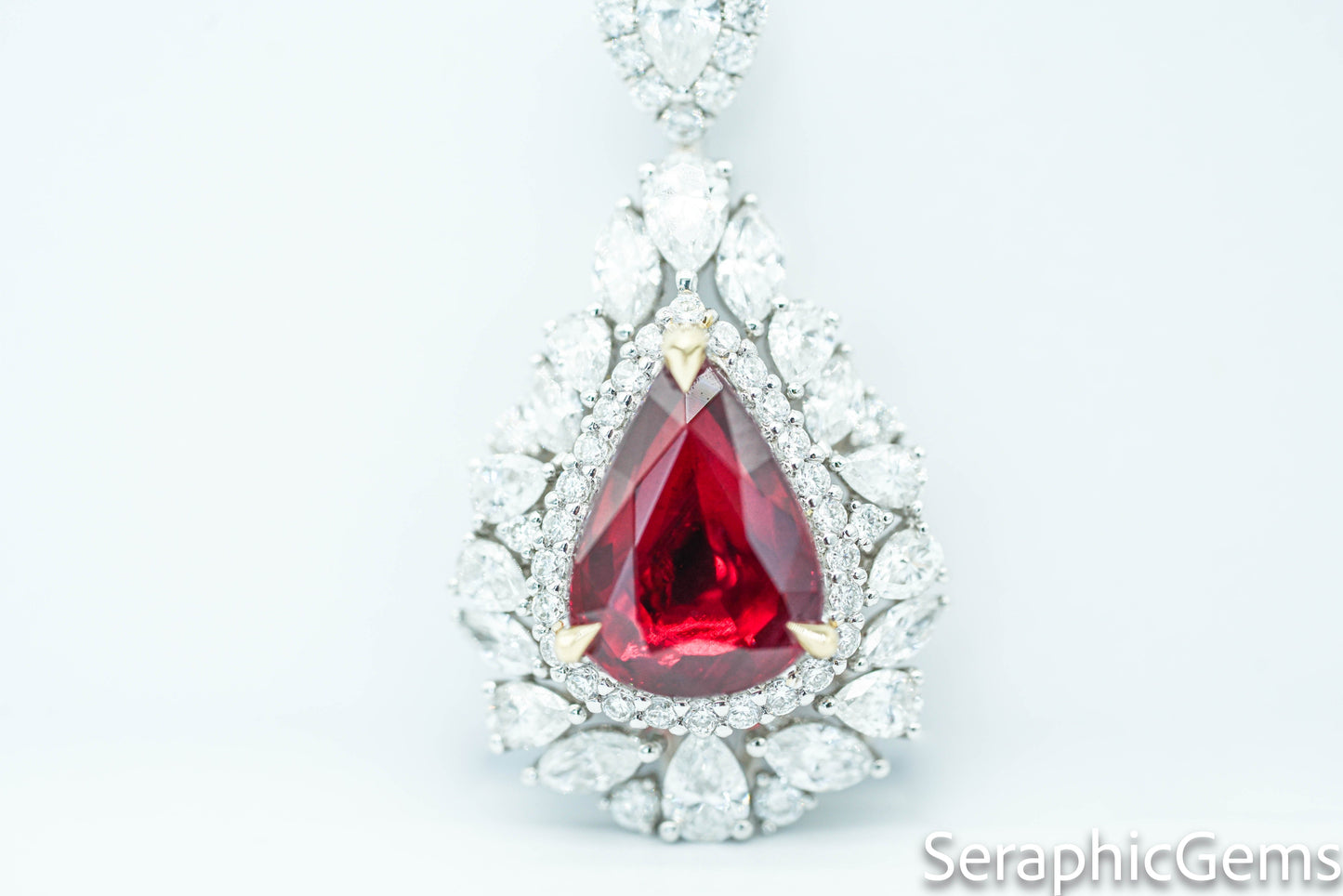 "Timeless Elegance: Pear-Shaped Pigeon Blood Ruby Ring in 18K Gold"