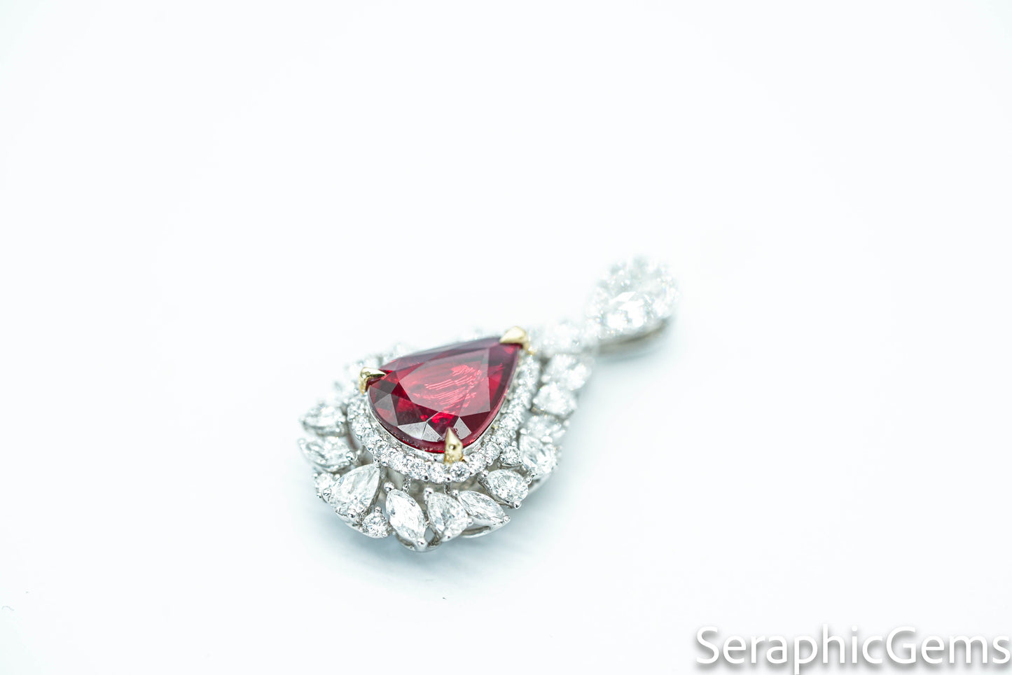 "Timeless Elegance: Pear-Shaped Pigeon Blood Ruby Ring in 18K Gold"