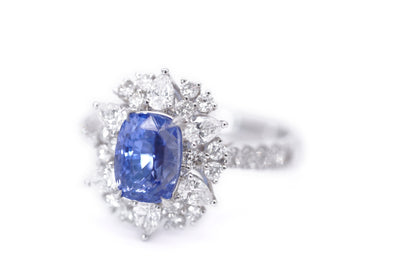 "Radiant Majesty: 3.01ct Sapphire and Diamond Halo Ring"